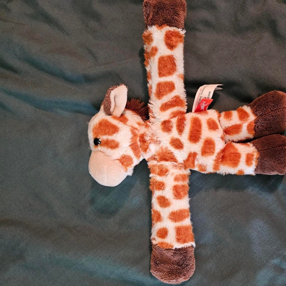 Wild Republic Huggers Giraffe Slap Bracelet Plush. Super cute Wild Republic
